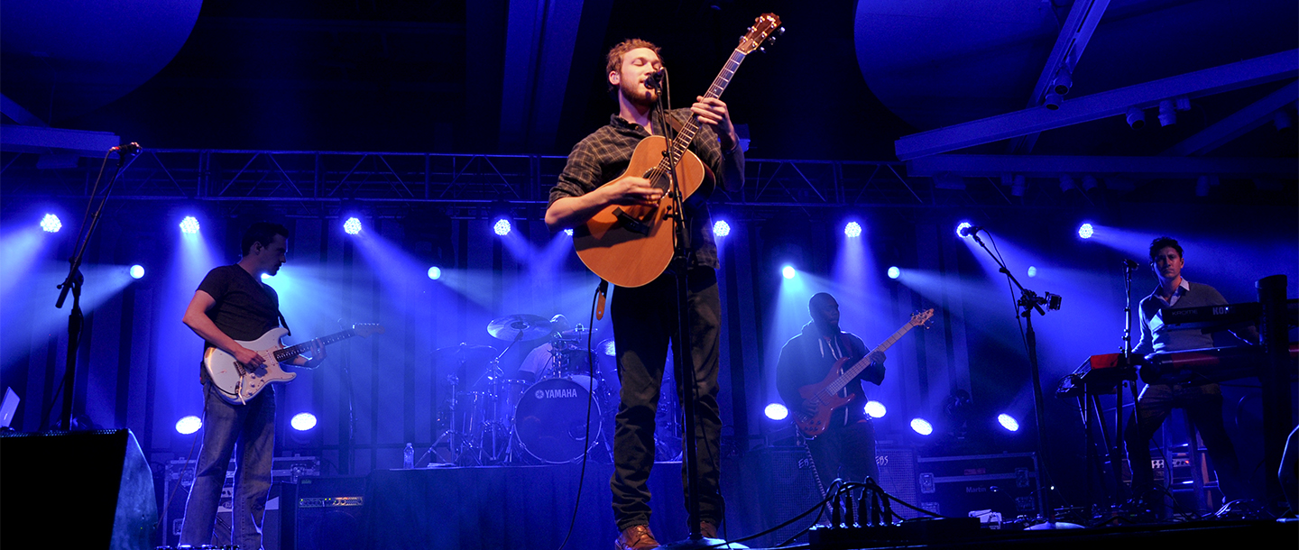 Phillip Phillips and the band performing on stage in Minnesota State University