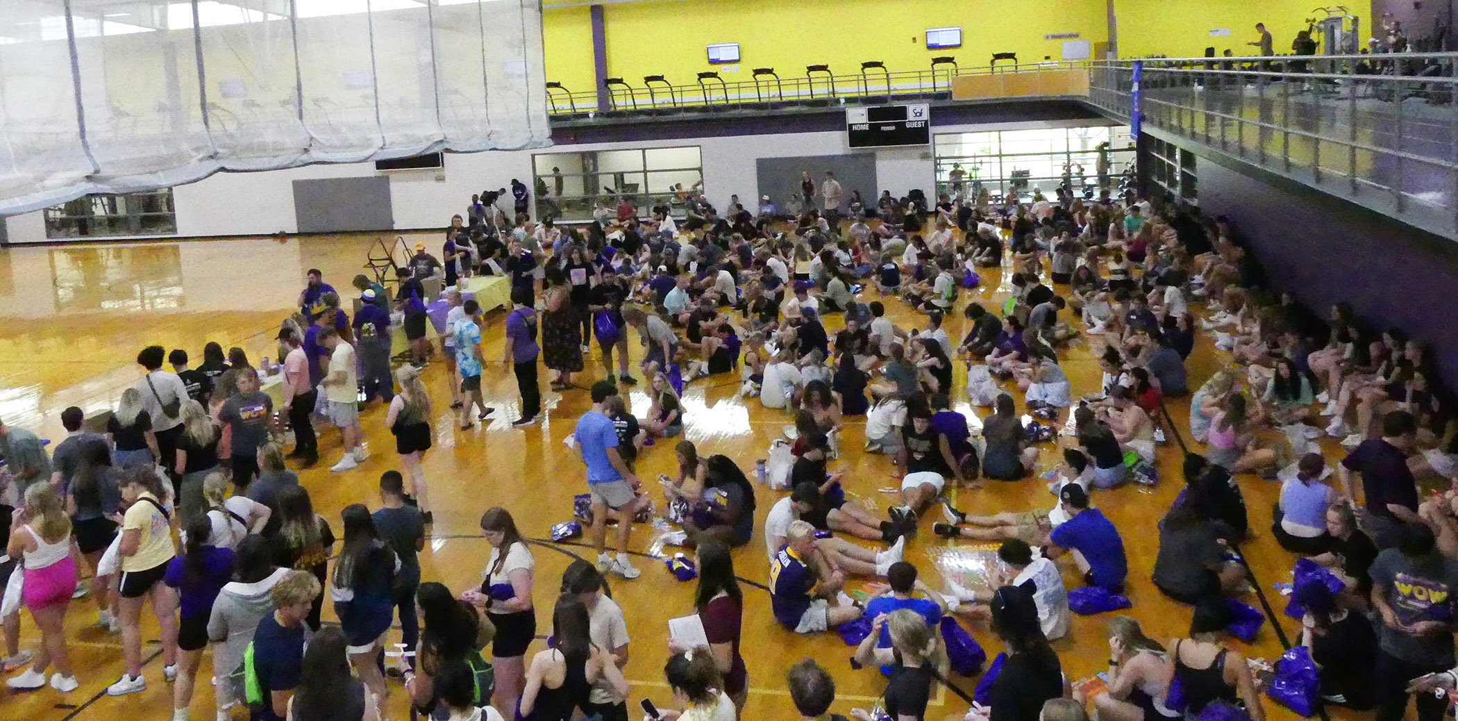 a large group of people in a gym