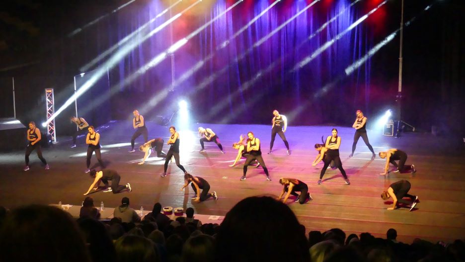 Picture of students participating in the Lip Sync event in Bresnan Arena