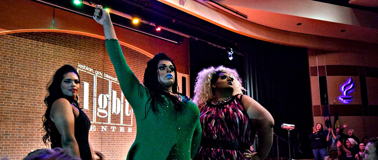 students posing for drag show