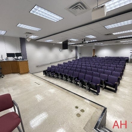 Small Auditorium with chairs rising to the back.
