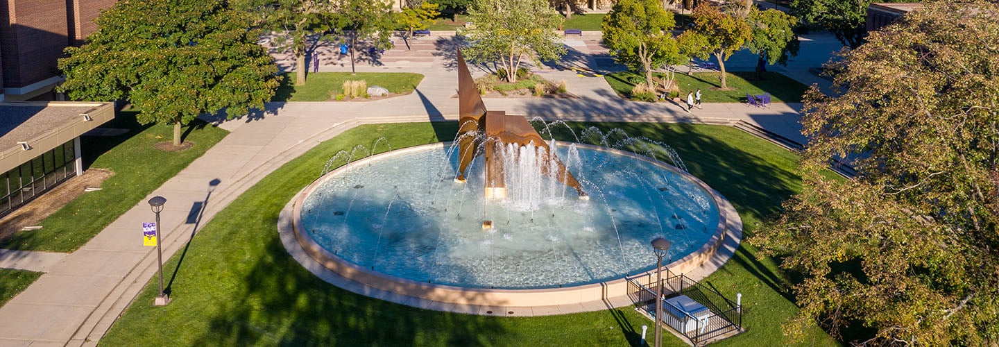 MSU's Fountain nestled in between the CSU and Library. Beautiful steel installation and bright blue water. 