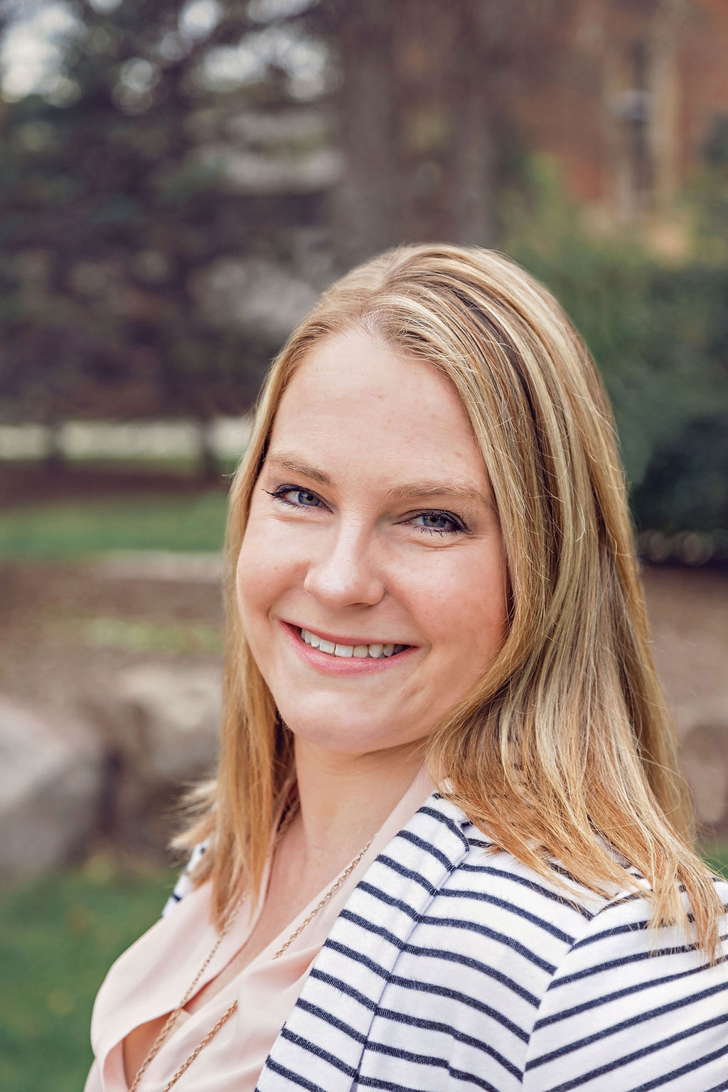 a person smiling at camera