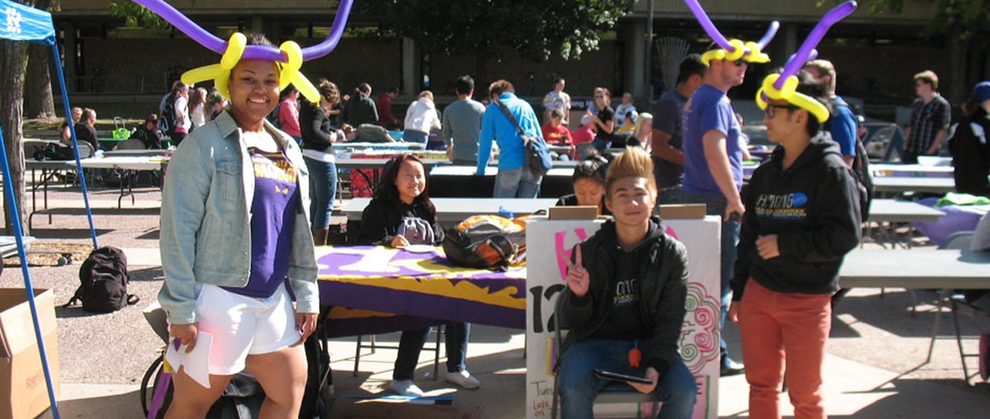 Students posing outside on campus during the Involvement festival