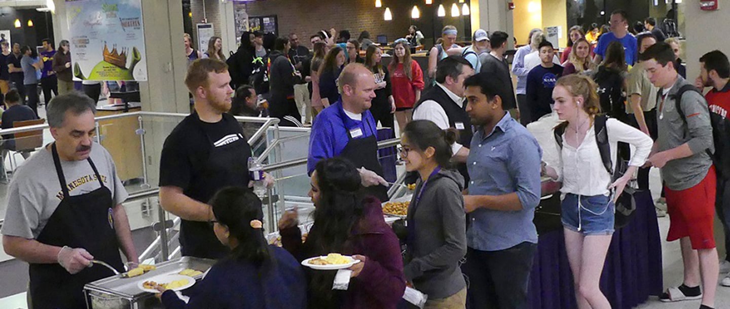 Students in line for the late night breakfast in the Centennial Student Union
