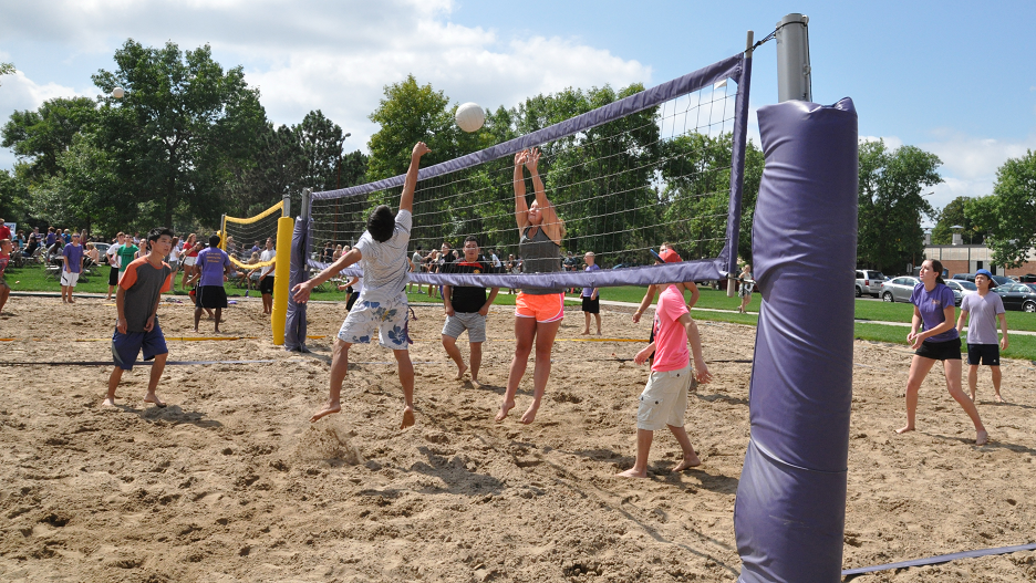 Picture of volleyball Game with crowd in the background