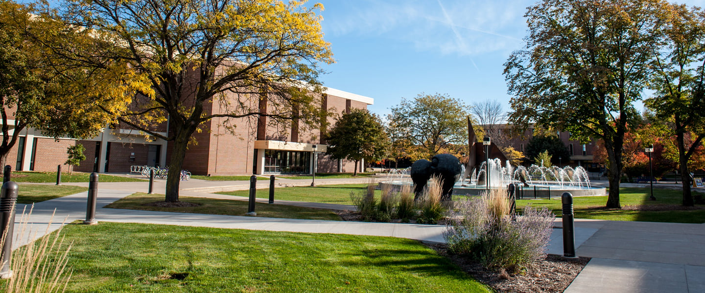 Memorial library and the fountain outside of the campus mall 