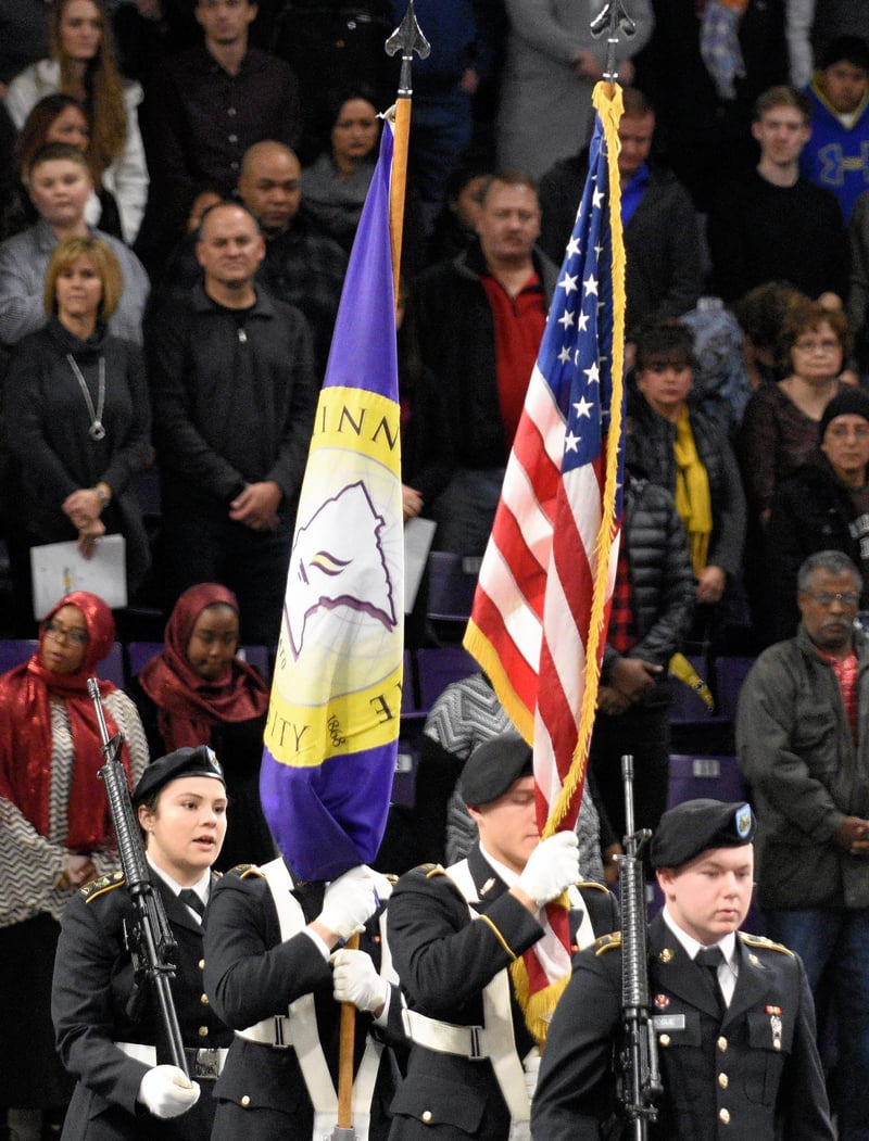 Minnesota State University, Mankato flag being carried in for commencement by the honor guard