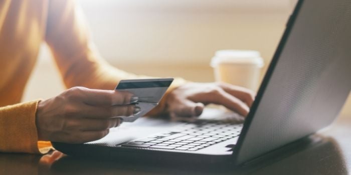 Photo of woman, shopping online, credit card