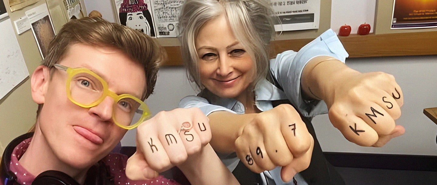 Ann Rosenquist Fee and Charlie Leftridge sporting KMSU knuckle tattoos