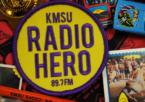 KMSU Radio Hero 89.7 FM patch with a photo, toy car, pencil and other small items