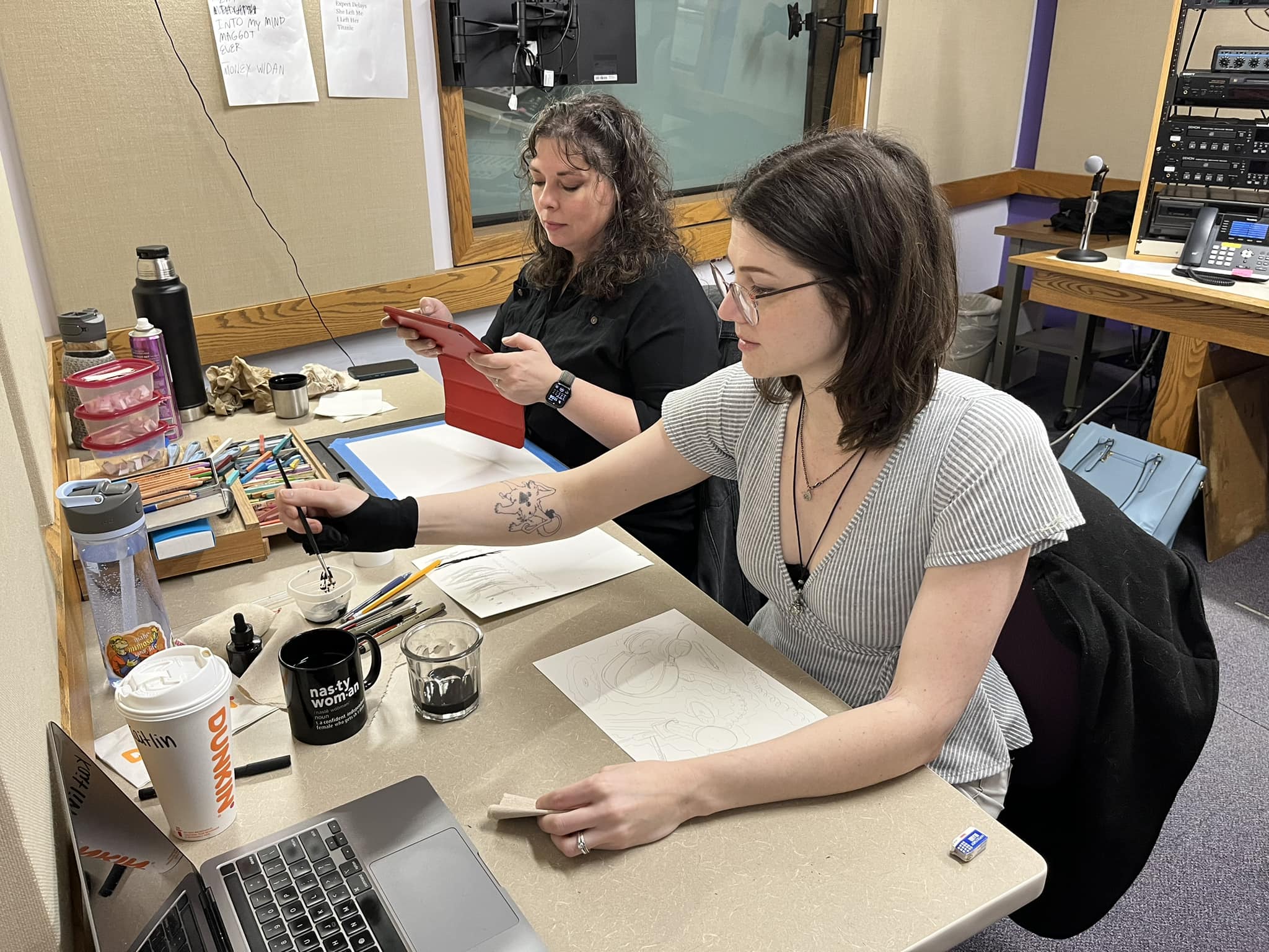 Amber Rahe and Kat Baumann creating art for pledges!