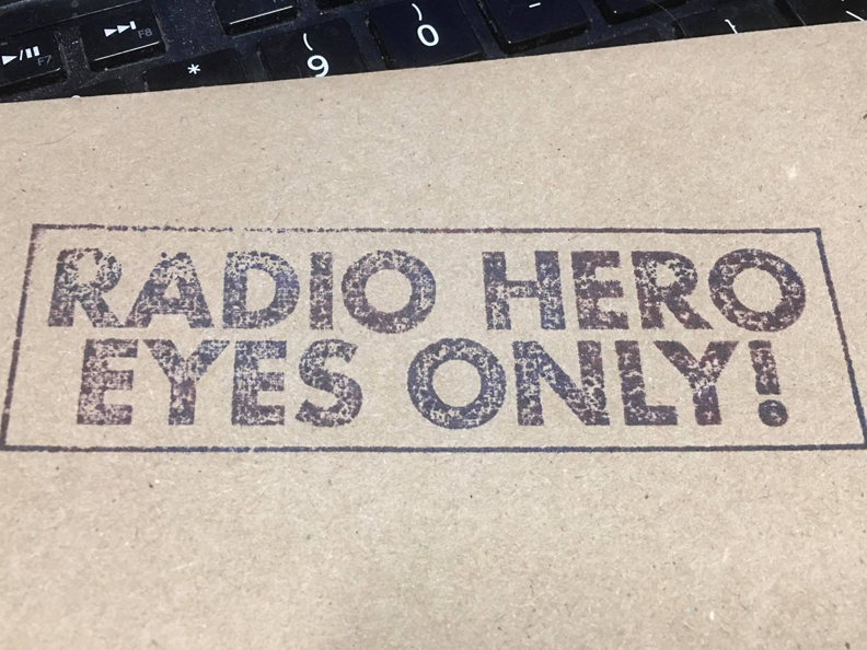 a brown cardboard with black text on it