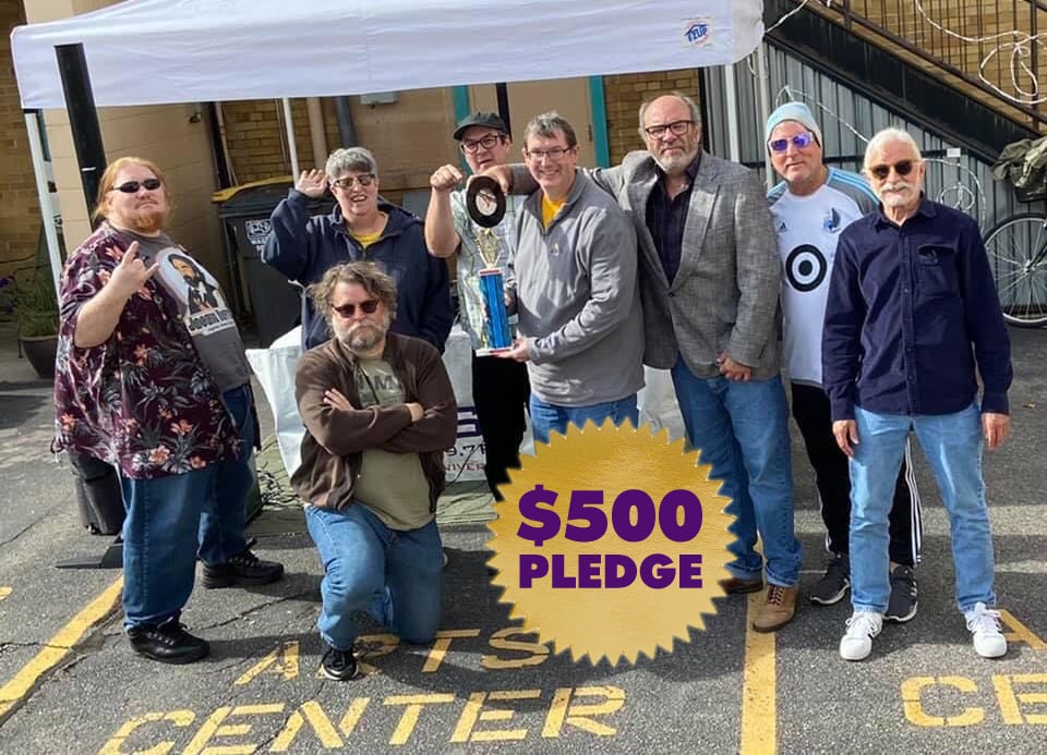 KMSU DJs standing in a parking lot. Get a DJ Soundclash for a $500 pledge.