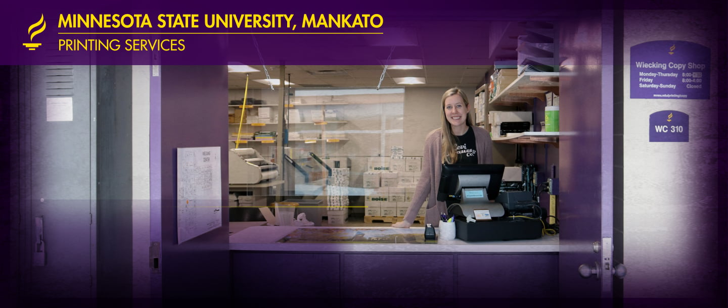 Minnesota State University, Mankato Creative Production staff posing at the front desk in the Wiecking copy shop