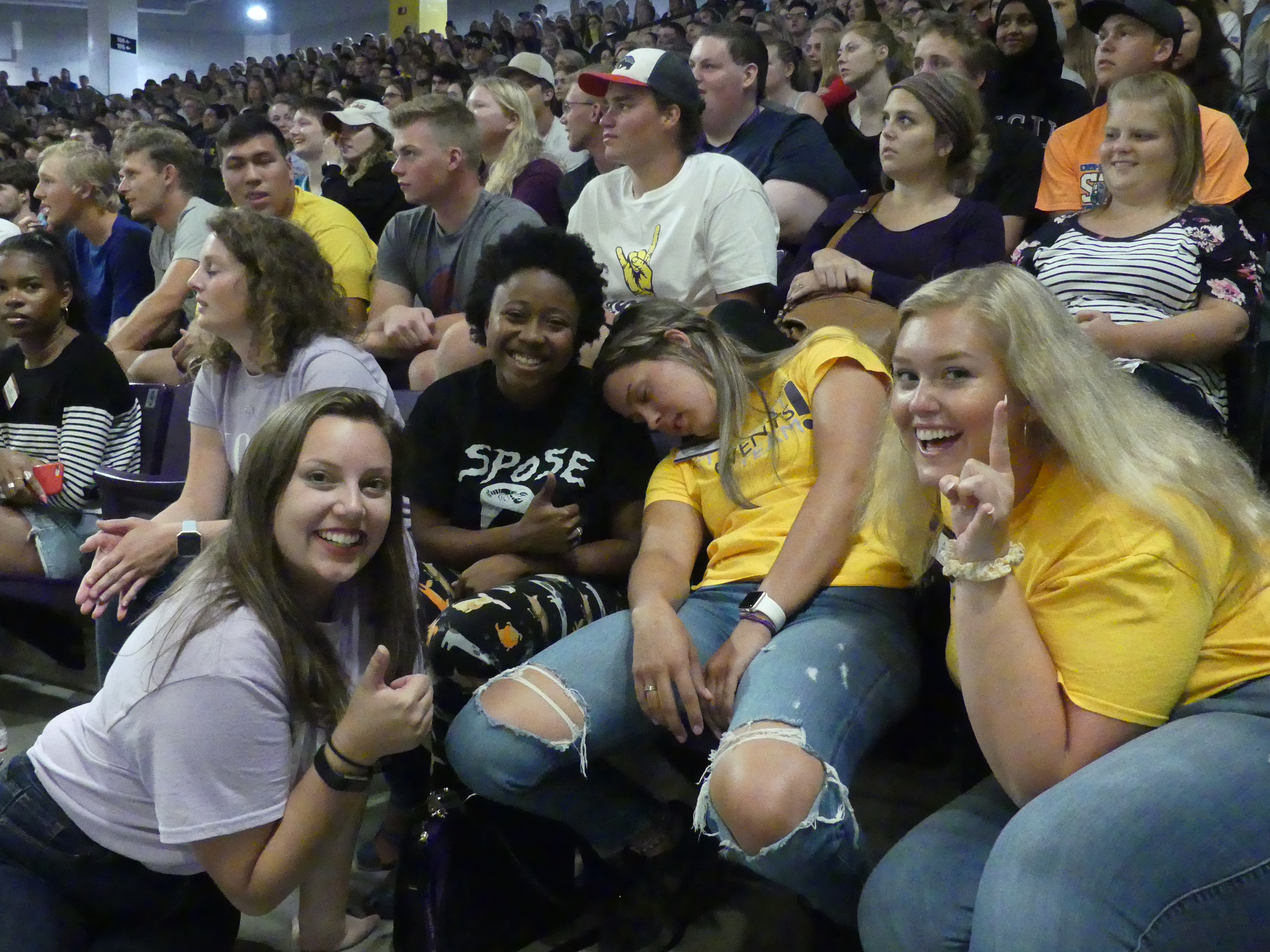 person asleep at hypnotist show