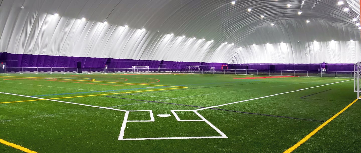 Softball field inside the Maverick All-Sports Dome