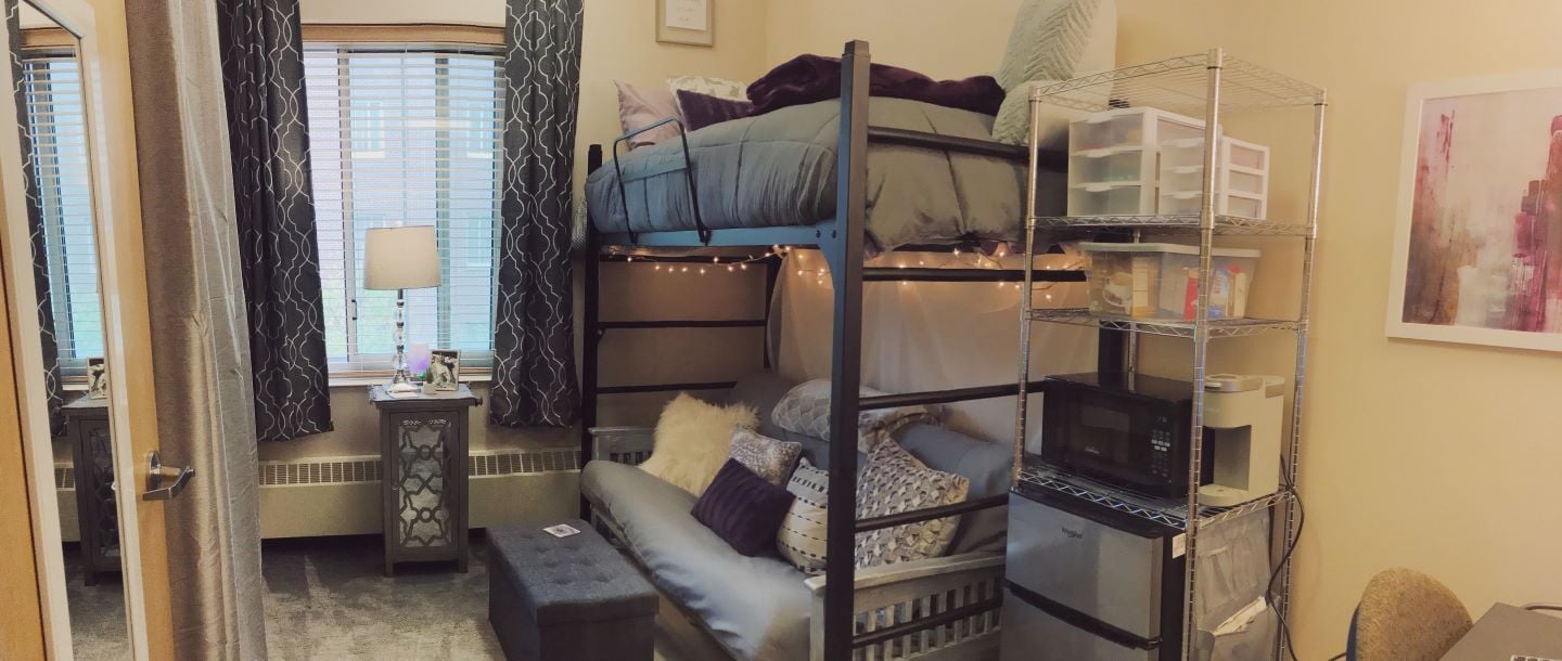 View inside a decorated single semi-suite on campus housing