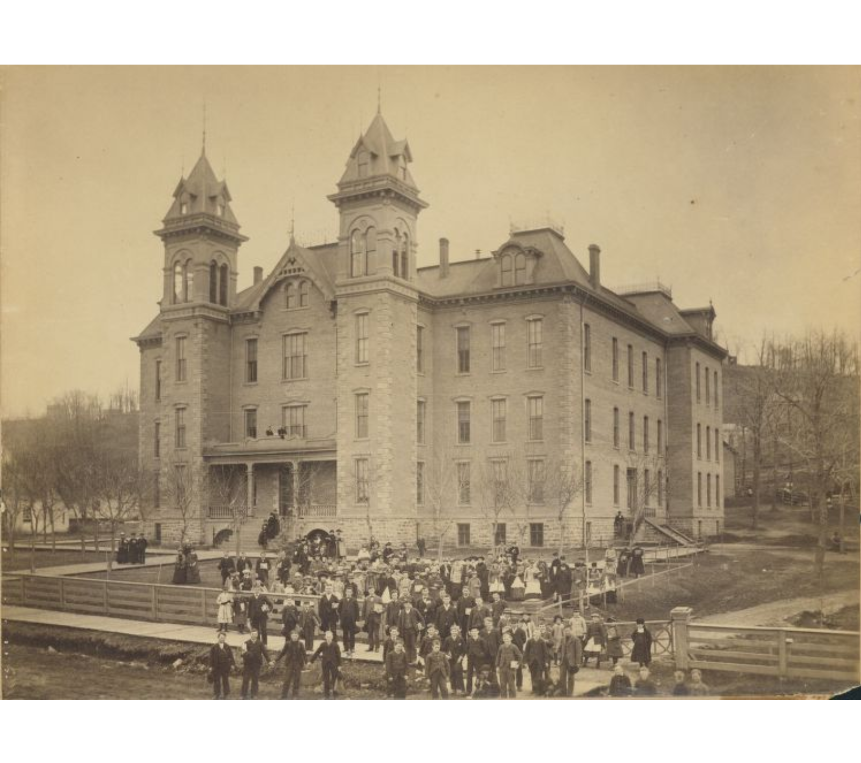 a group of people outside of a building