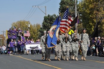 a group of soldiers marching in a parade